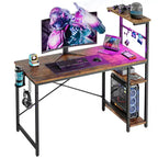 Bureau de jeu Bestier 112 cm avec éclairage LED RGB, étagères de rangement réversibles à 4 niveaux, crochets, porte-gobelet et aimants