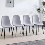 Un ensemble de 4 chaises cuillères en tissu gris et métal – parfaitement assorties à la décoration intérieure minimaliste et de style scandinave.