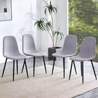 A set of 4 grey fabric-backed and metal combination spoon chairs - a perfect match for minimalist and Scandinavian-style home decor