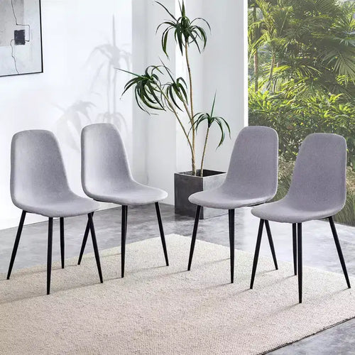 A set of 4 grey fabric-backed and metal combination spoon chairs - a perfect match for minimalist and Scandinavian-style home decor