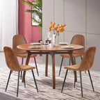 Un ensemble de 4 chaises cuillères en tissu gris et métal – parfaitement assorties à la décoration intérieure minimaliste et de style scandinave.