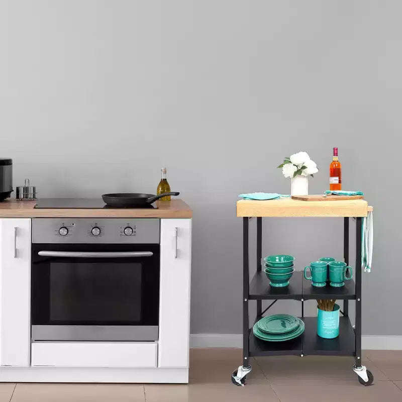 Îlot de cuisine portable Origami pliable sur roulettes avec structure en acier/plateau en bois massif, étagères ouvertes et porte-serviettes intégré, noir