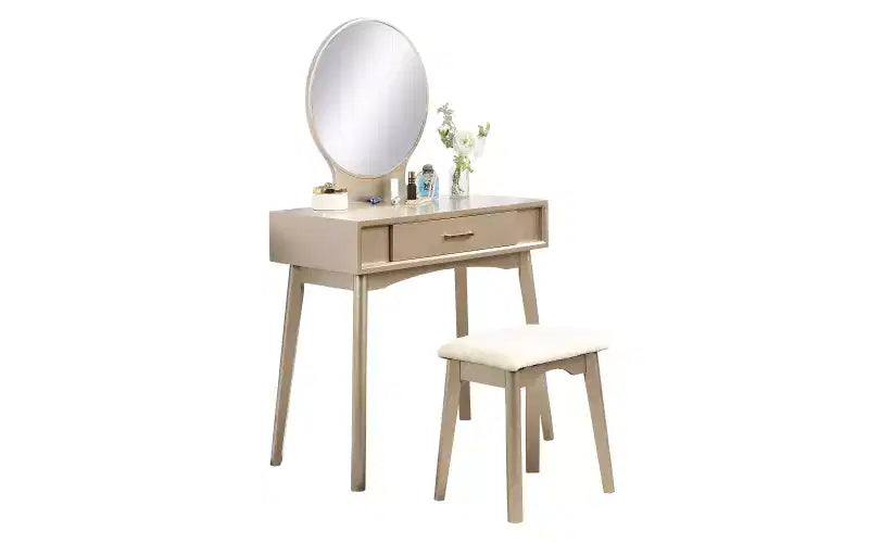 Coiffeuse moderne avec miroir rond, rangement organisé, tabouret assorti pour chambre à coucher, finition dorée, design peu encombrant