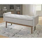 Banc de rangement capitonné contemporain de 127 cm de largeur, beige/marron, siège à charnière, pieds en bois